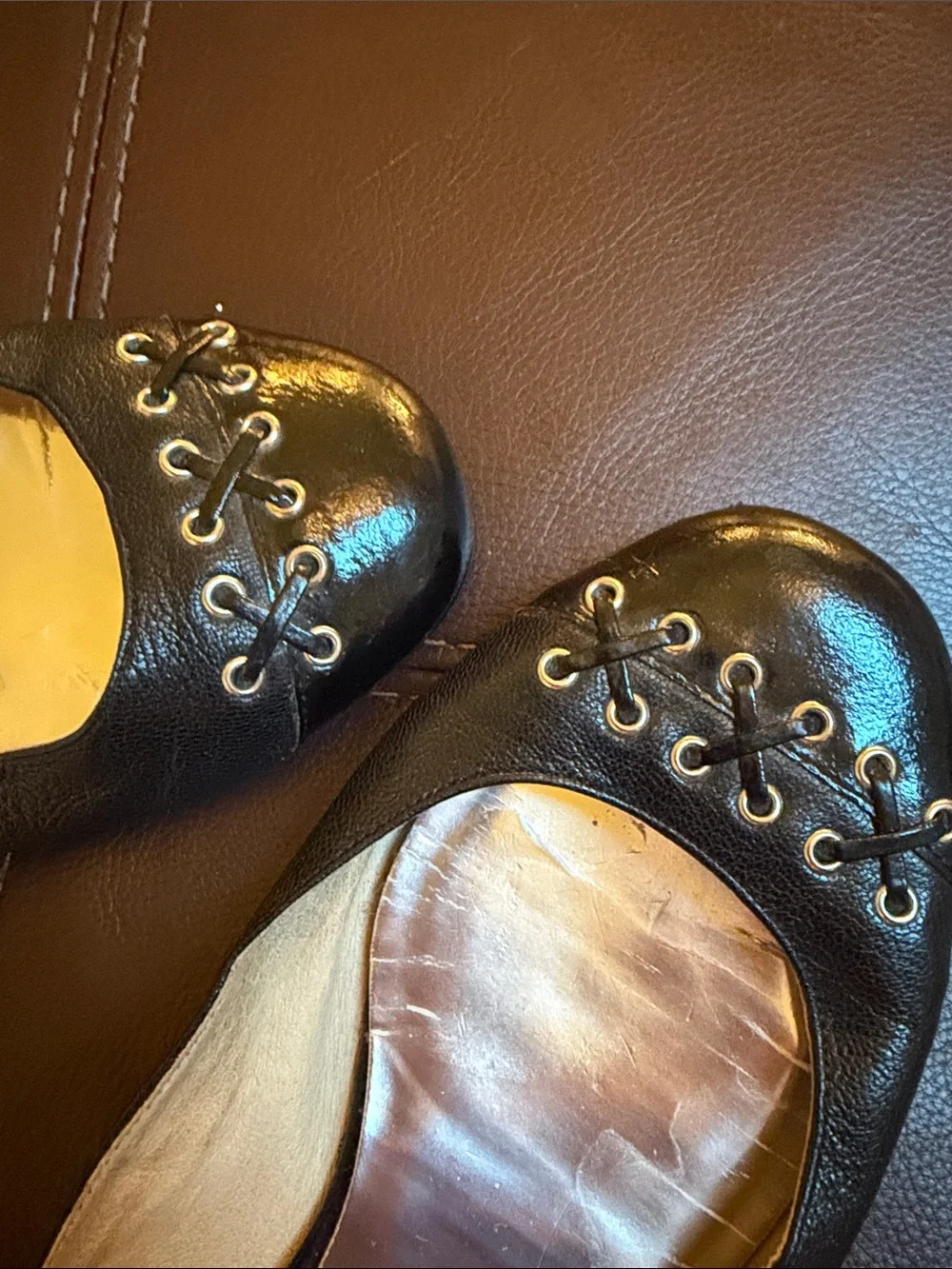Micheal Kors black flats with grommet /leather detail sz 9.5